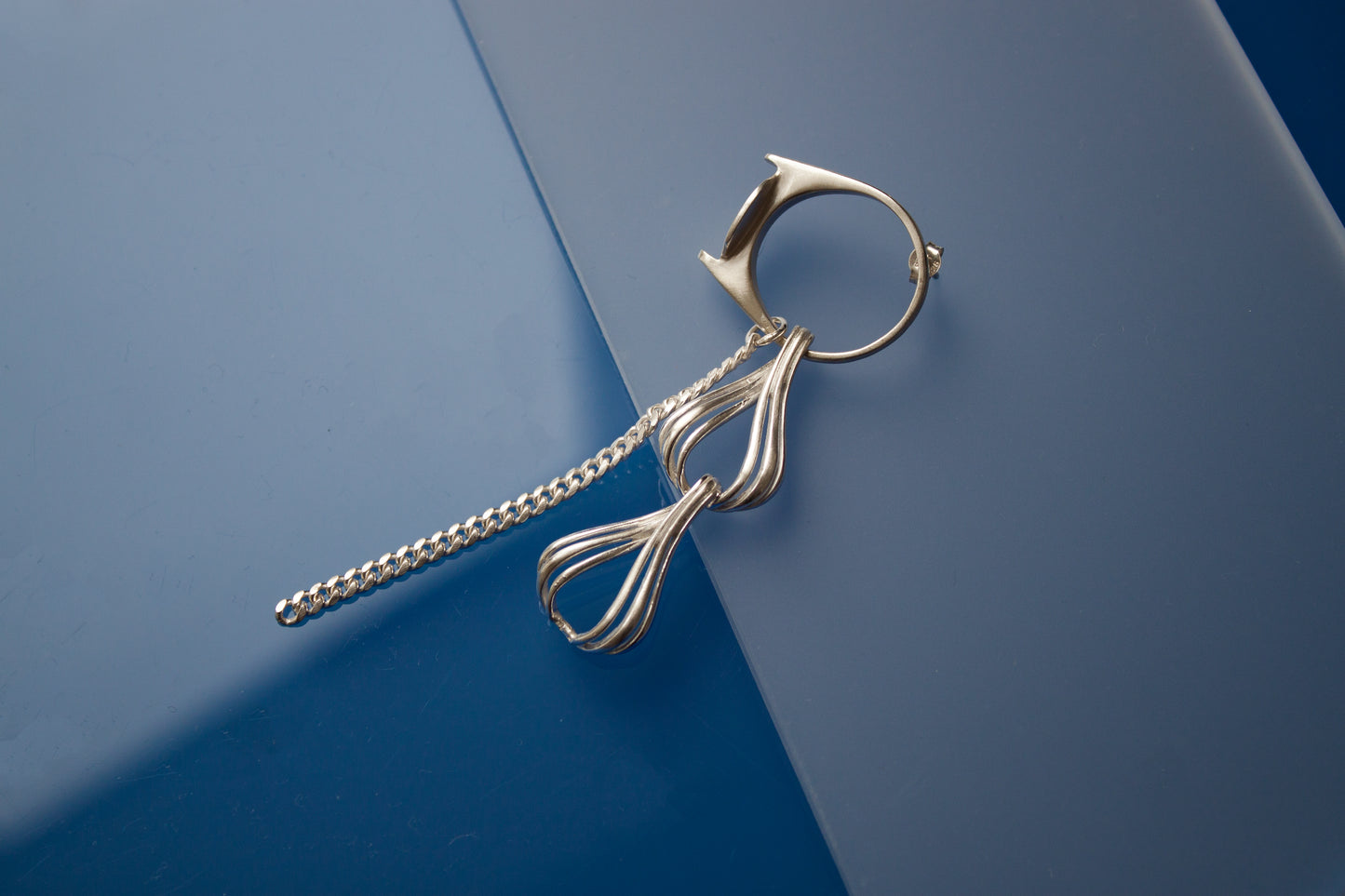 Ear-ring in 925 silver, collage-like recycled jewellery, one-of-a-kind by Minou Lejeune