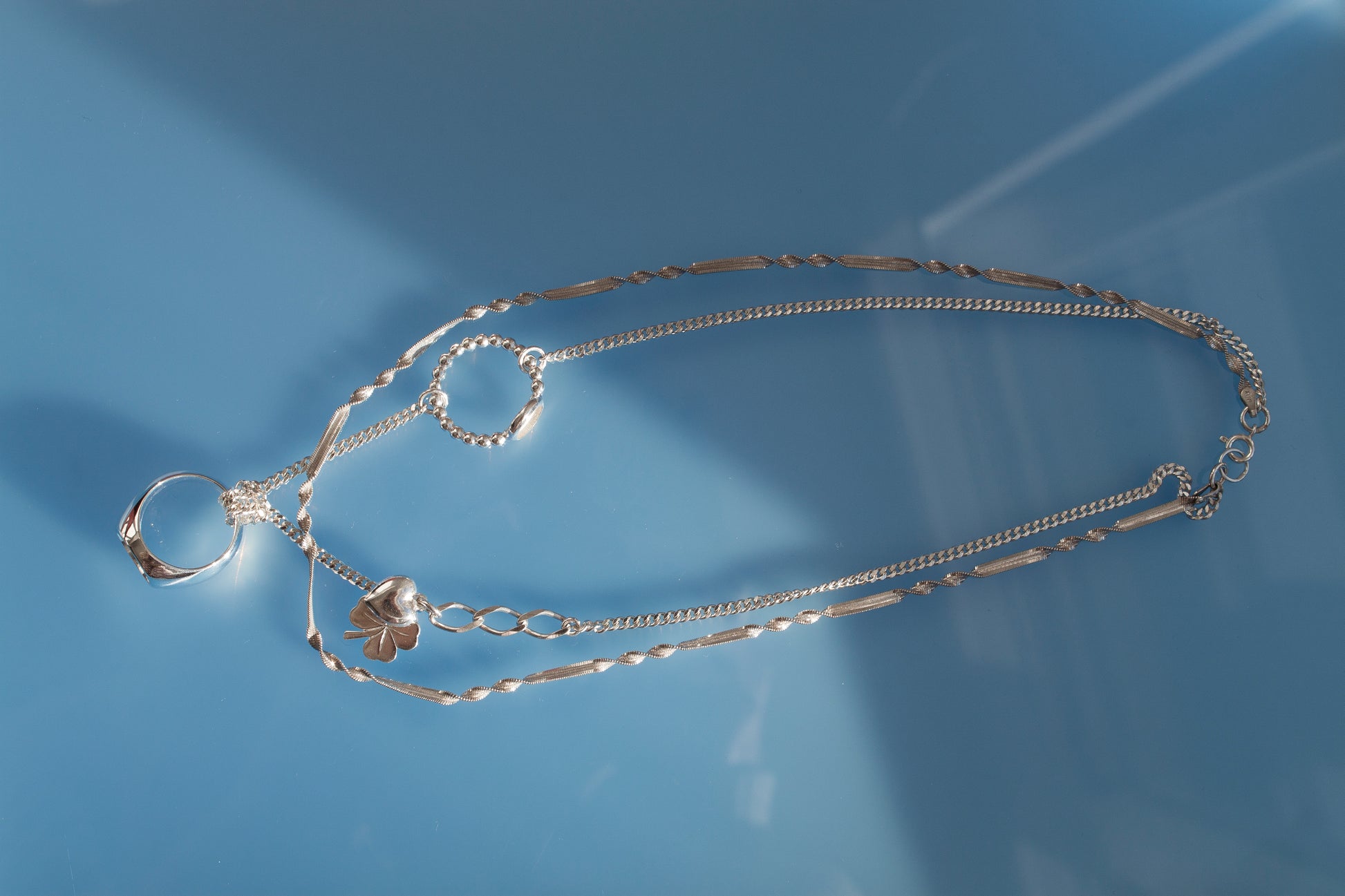 Double Chained & Knotted Necklace in 925 silver, collage-like recycled jewellery, one-of-a-kind by Minou Lejeune