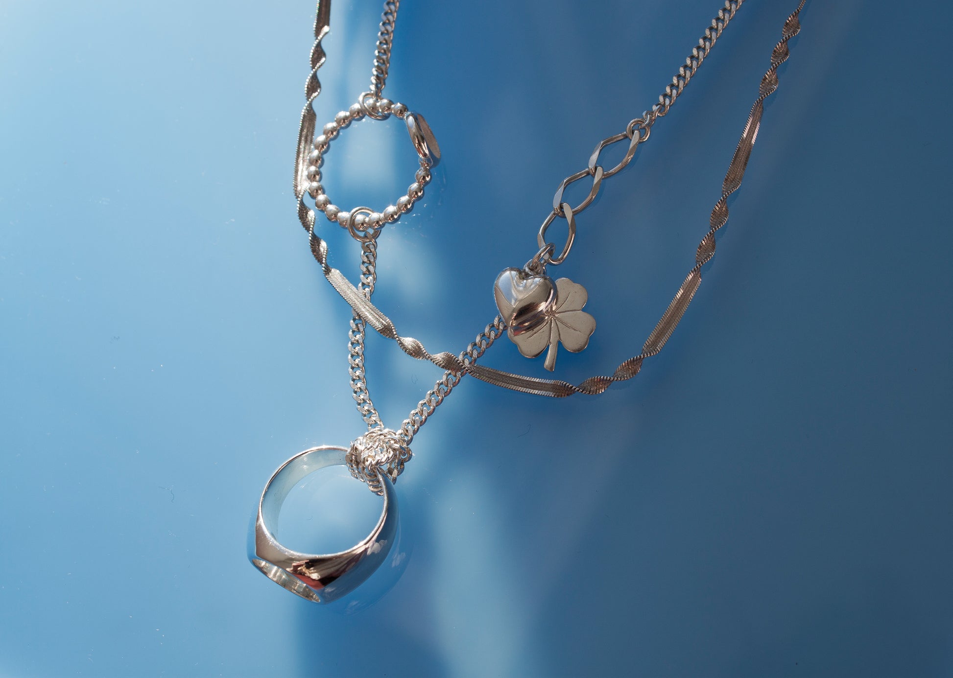 Double Chained & Knotted Necklace in 925 silver, collage-like recycled jewellery, one-of-a-kind by Minou Lejeune