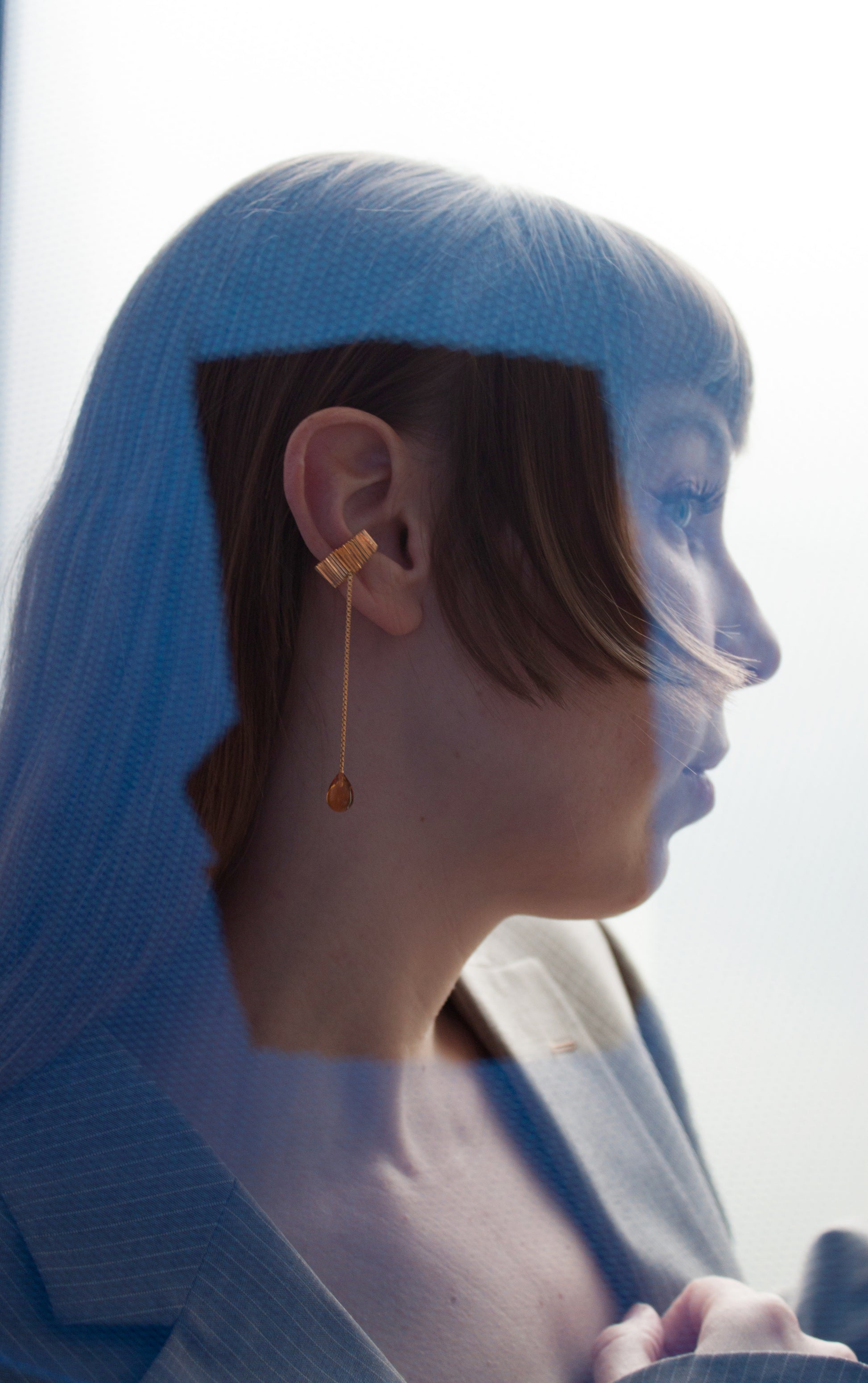 Hand-carved earcuff with gemstone, unique piece by Minou Lejeune