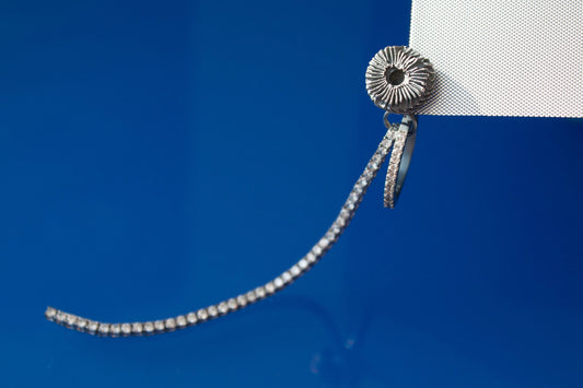 Earring Flower in 925 silver, collage-like recycled jewellery, one-of-a-kind by Minou Lejeune