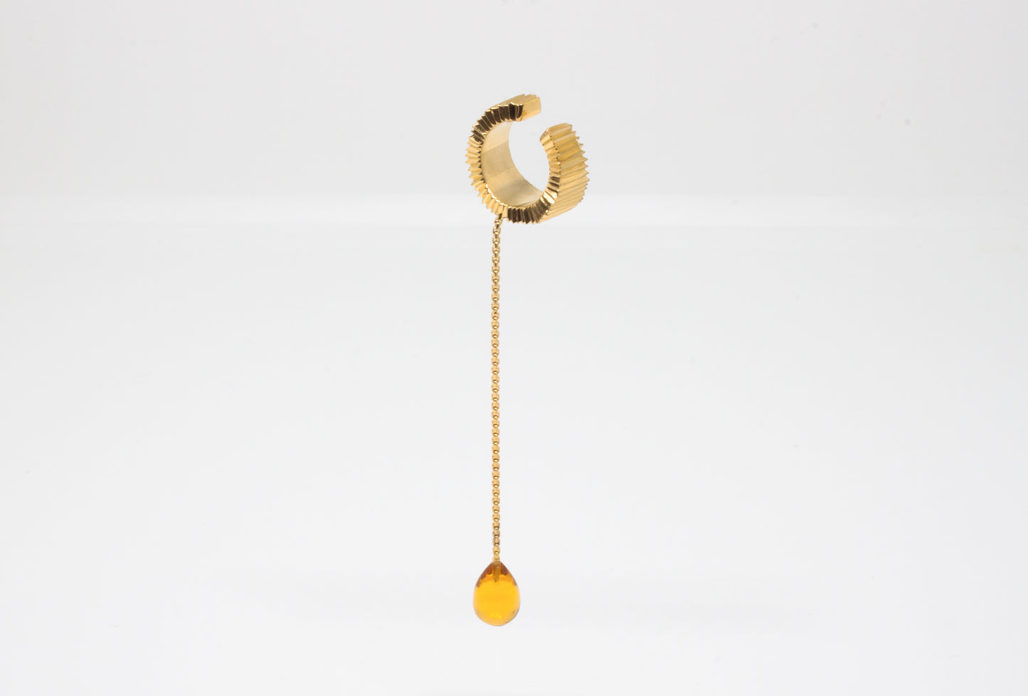 Hand-carved earcuff in goldplated silver with Citrine gemstone, one-of-a-kind piece by Minou Lejeune