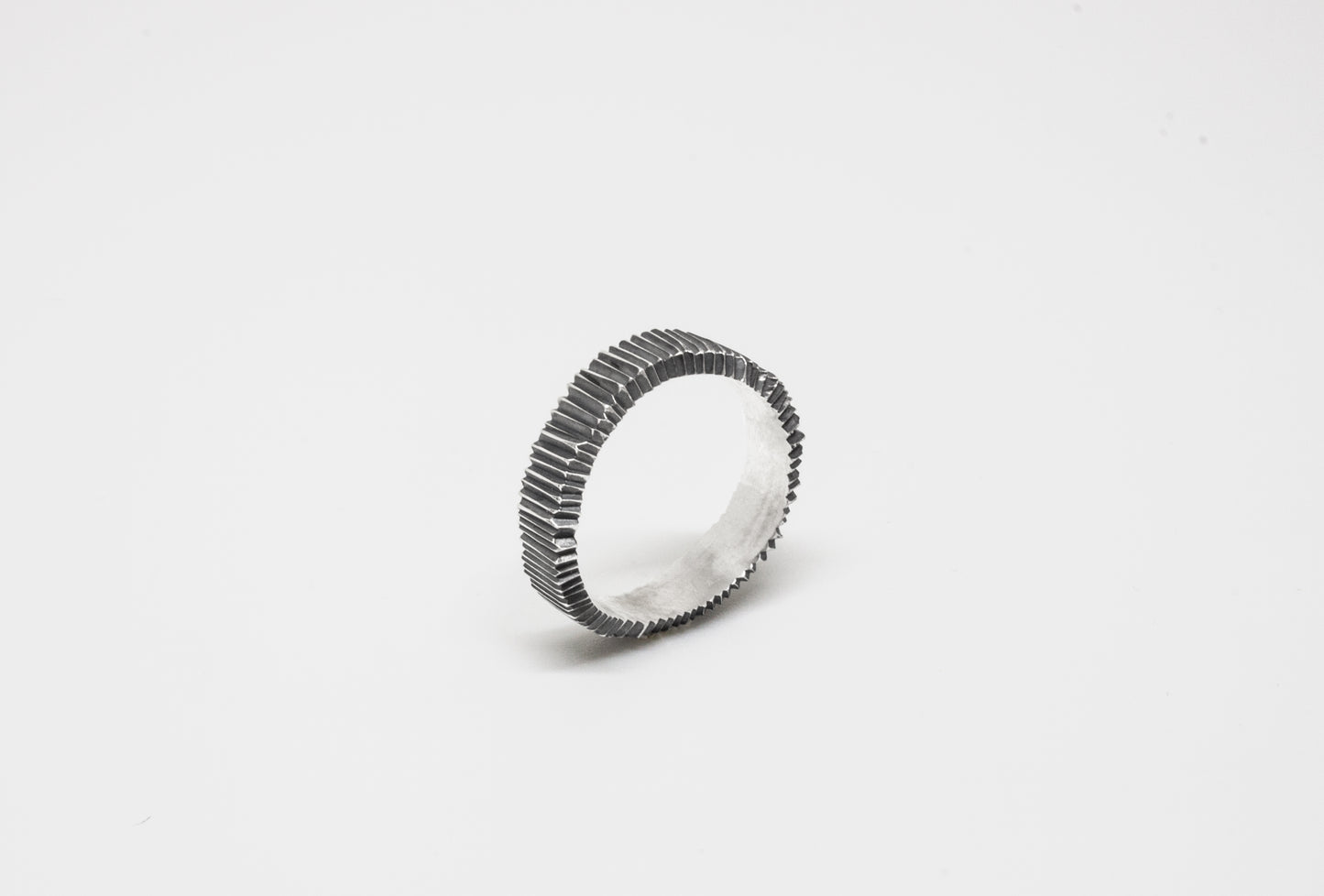 Irregular Carved Ring in 925 oxidated silver, hand-carved and unique piece by Minou Lejeune