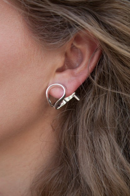 Loop Earrings in 925 silver, sculptural twisted earrings handcrafted by Minou Lejeune